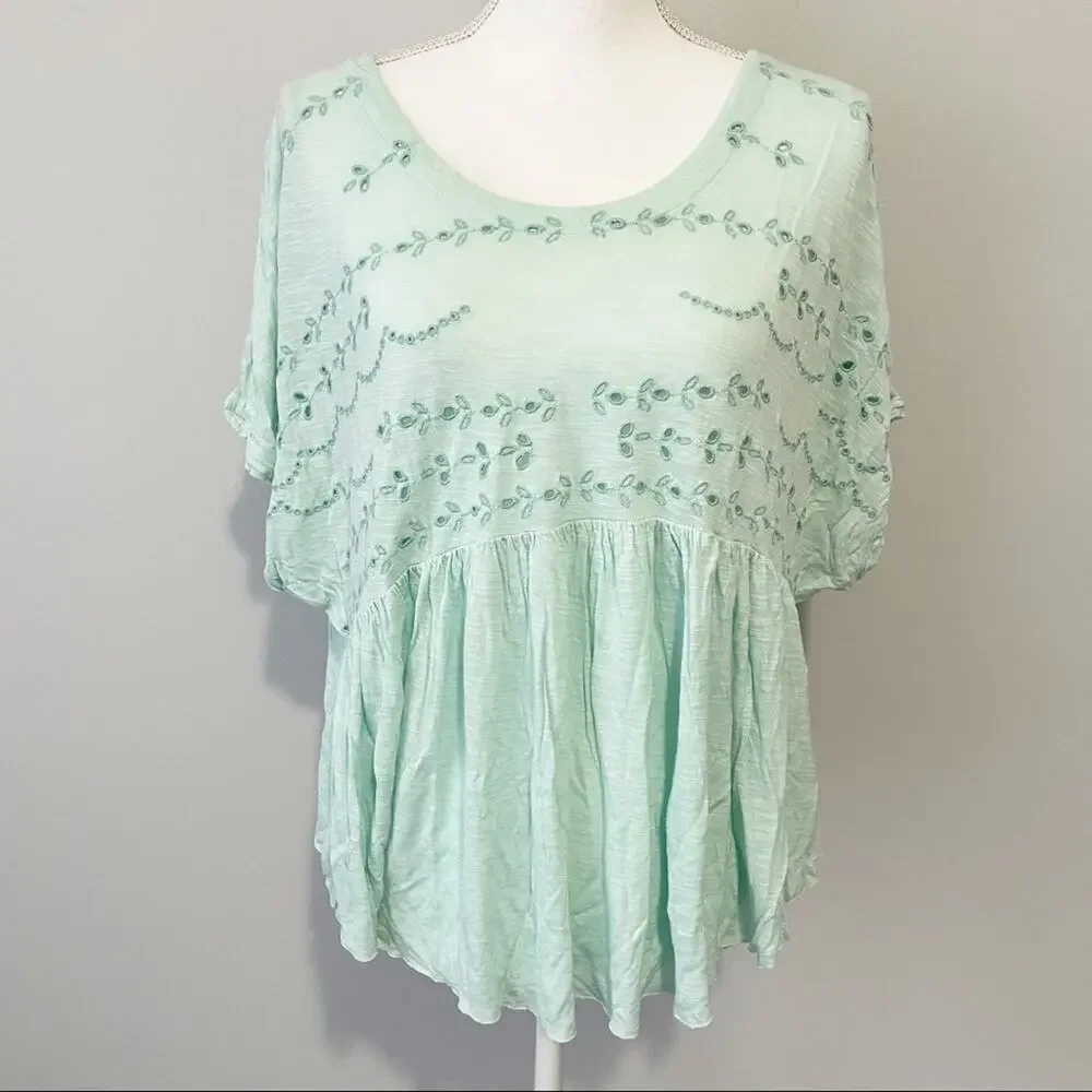 Free People teal green eyelet dolman short sleeve size medium flowy